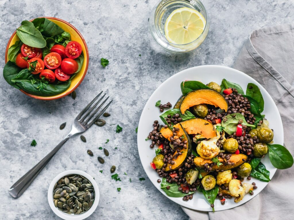 Lentil salad on plate representing foods with high fiber.