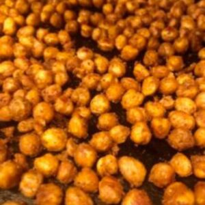 Crispy roasted chickpeas on a plate seasoned with Old Bay.