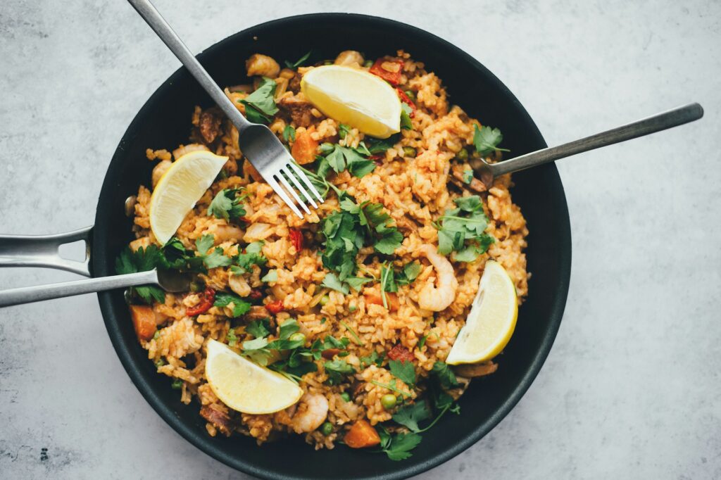 Low-carb stir-fry with cauliflower rice with vegetables, highlighting cauliflower's versatility in healthy diets.