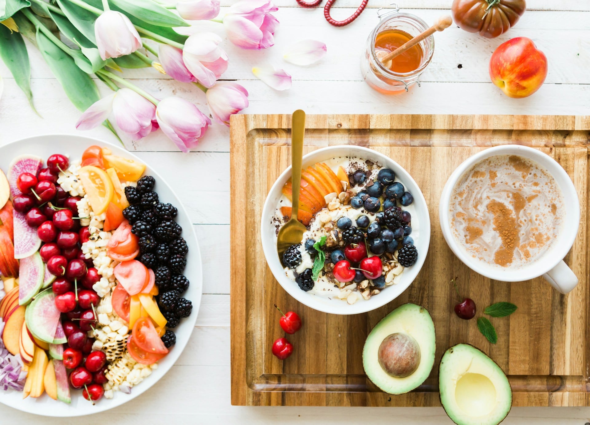 Assorted healthy foods including fruits, proteins, and whole grains, representing a balanced diet guided by expert nutrition counseling for improved overall health and wellness.