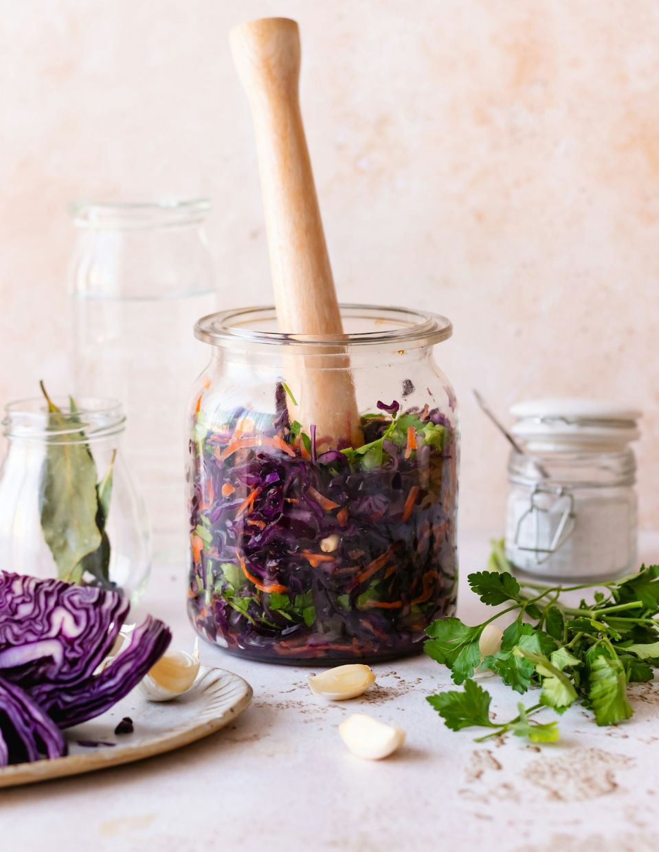 A glass jar filled with vibrant purple fermented cabbage, highlighting its probiotic-rich benefits for gut health.